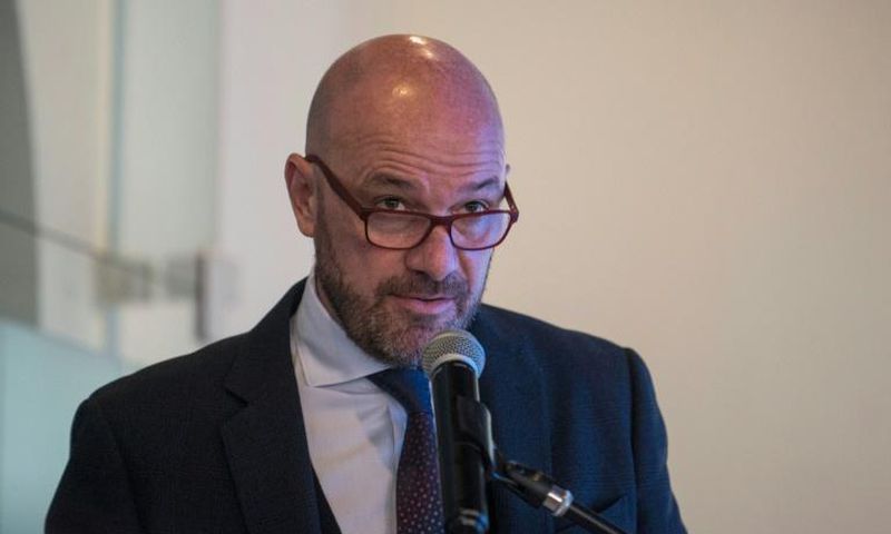 The UN's human rights chief in Colombia, Alberto Brunori, presents the UN's annual report on human rights in Colombia at a news conference in Bogota on Thursday