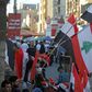 A Baghdad street vendor sells flags of Iraq and Lebanon, both gripped by anti-government protests