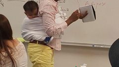 Professor Ramata wears student’s baby for 3 hours as she lectures