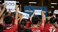 Hong Kong fans turned their backs and booed when the Chinese national anthem was played