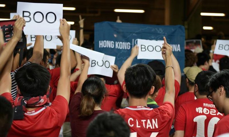 Hong Kong fans turned their backs and booed when the Chinese national anthem was played