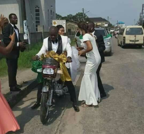Newly weds spotted on a motorbike