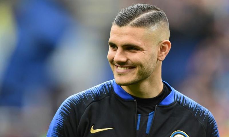 (FILES) This file photo taken on April 7, 2019 shows Inter Milan's Argentine forward Mauro Icardi smiling prior to the Italian Serie A football match Inter Milan vs Atalanta Bergamo at the San Siro stadium in Milan.Argentinian forward Mauro Icardi join...