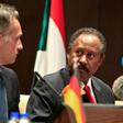 German Foreign Minister Heiko Maas (L) and Sudan's Prime Minister Abdallah Hamdok give a joint press conference in the Sudanese capital Khartoum on Tuesday