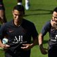 Neymar (R) jokes with PSG teammate Thiago Silva at a training session on Thursday