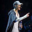 Singer Justin Bieber stands on stage during a concert in Oslo October 29, 2015