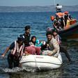 Migrants helped by rescuers arrive on the Greek island of Lesbos after crossing the Aegean Sea from Turkey, on September 16, 2019