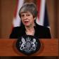 Britain's Prime Minister Theresa May offered to work with opposition Labour leader Jeremy Corbyn