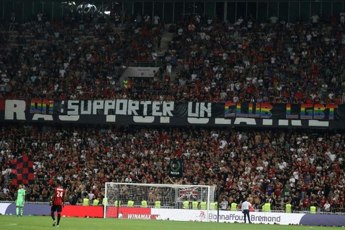 Nice supporters display a banner mocking Marseille as an "LGBT club" during a match suspended for homophobic abuse