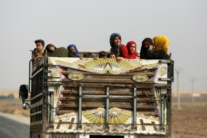 A new wave of fleeing civilians have taken to the roads of northeastern Syria in recent days as Turkish troops and their allies have widened their offensive to the border town of Kobane, once a symbol of Kurdish resistance to the Islamic State group
