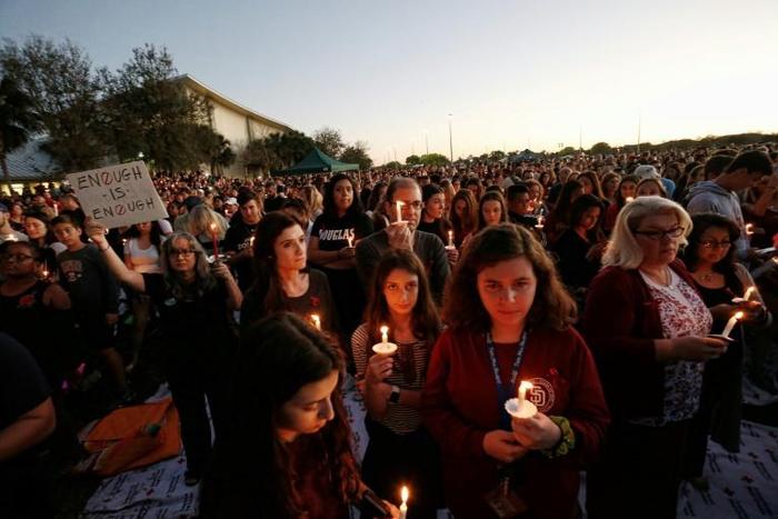 The Parkland survivors, pictured at a vigil the day after the massacre, rejected the usual outpourings of sympathy offered by politicians