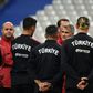 Turkey coach Senol Gunes (C) talks to his players during a training session at the Stade de France