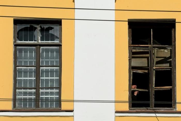 The blast in a first-floor classroom caused a staircase to collapse and trapped around 20 people, reports said