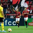 Urawa's midfielder Fabricio raises his arm to celebrate his first-half goal against Guangzhou Evergrande during the AFC Champions League semi-final first leg in Saitama