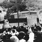 Iranian revolutionary students climb the American embassy's gate in Tehran on November 4, 1979 less than nine months after the toppling of the US-backed shah