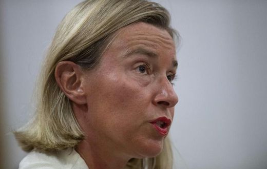 European Union foreign policy chief Federica Mogherini says Venezuela's government and opposition should return to the negotiating table