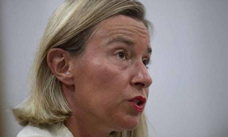 European Union foreign policy chief Federica Mogherini says Venezuela's government and opposition should return to the negotiating table