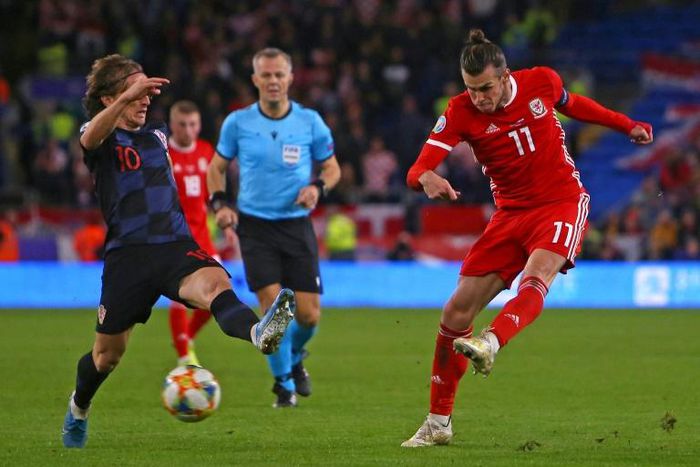 Gareth Bale (right) and Luka Modric (left) played against each other in the 1-1 draw between Wales and Croatia on Sunday.