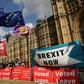 Flags flutter as activists gather near the Houses of Parliament in central London on September 4, 2019 to demonstrate for and against Brexit