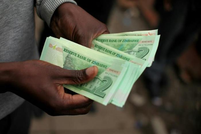 Electronic money and "bond" notes -- a legal tender pegged to the US dollar -- were introduced to ease cash shortages