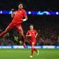 Serge Gnabry (C) celebrates after scoring four goals for Bayern Munich in their 7-2 thrashing of Tottenham Hotspur in the Champions League two weeks ago