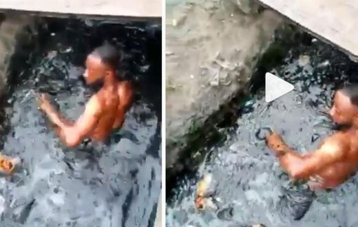 Angry soldier makes phone thief swim in a dirty gutter (video)