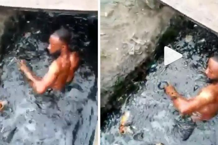 Angry soldier makes phone thief swim in a dirty gutter (video)
