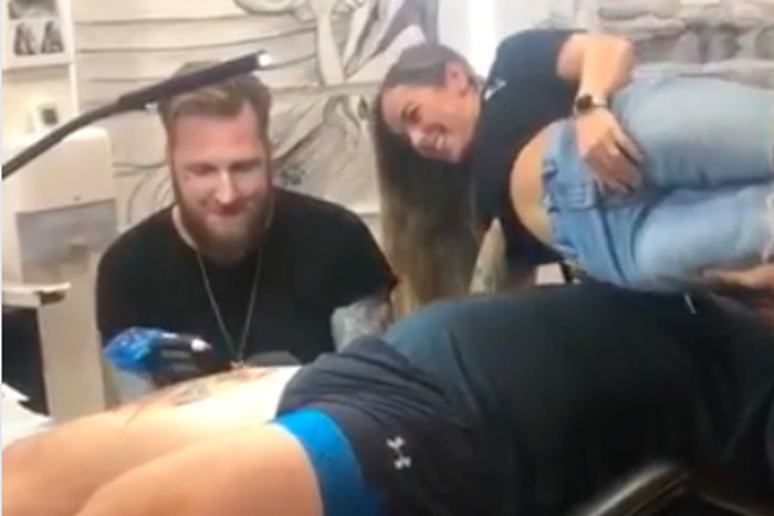 The Mountain Bench Presses Wife in Tattoo Studio