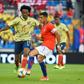 Alexis Sanchez captained Chile against Colombia until he injured an ankle