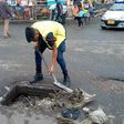 Lance Corporal Simon Agbeko desilts choked drains in Accra