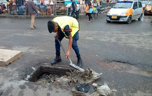 Lance Corporal Simon Agbeko desilts choked drains in Accra