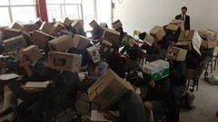 Teacher in trouble for making students wear cardboard boxes in exam hall to avoid cheating
