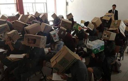 Teacher in trouble for making students wear cardboard boxes in exam hall to avoid cheating