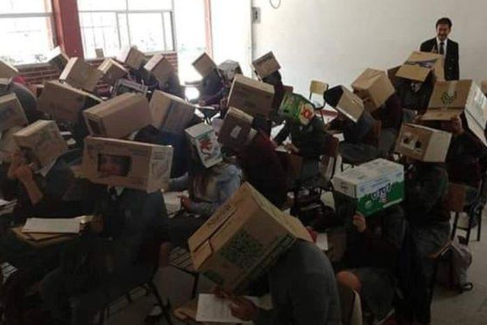 Teacher in trouble for making students wear cardboard boxes in exam hall to avoid cheating