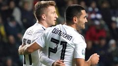 Manchester City midfielder Ilkay Gundogan (R) celebrates scoring twice in Germany's 3-0 win at Estonia on Sunday in a Euro 2020 qualifier