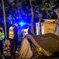 Around 600 police officers calmly escorted the migrants off the makeshift camps