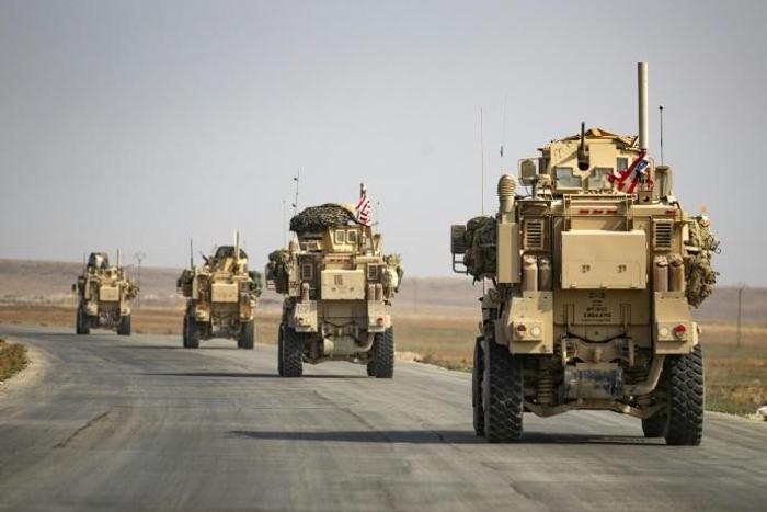 US military vehicles in northern Syria after US forces pulled out of their base in Tal Tamr on October 20
