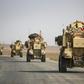US military vehicles in northern Syria after US forces pulled out of their base in Tal Tamr on October 20