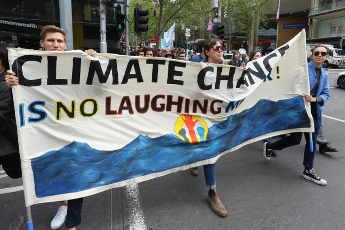 'We have tried petitions, lobbying and marches, and now time is running out.' Extinction Rebellion protesters in Melbourne, Australia.