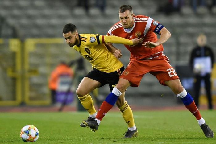 Zenit's Artem Dzyuba tussles for the ball with Belgium's Eden Hazard during Russia's 3-1 Euro 2020 qualifier defeat this week