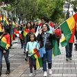 People take to the streets of La Paz to celebrate the resignation of Bolivian President Evo Morales on November 10, 2019