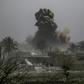 Smoke plumes billows after shelling of the Islamic State (IS) group's last holdout of Baghouz in eastern Syria near the border with Iraq
