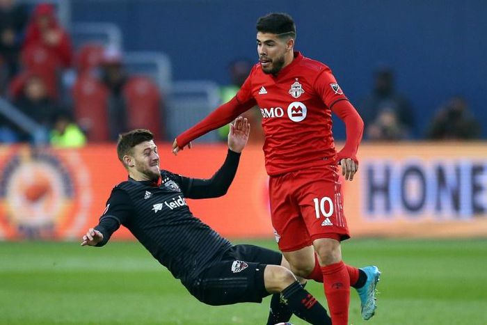 Toronto FC's Alejandro Pozuelo, evading a tackle attempt by DC United's Paul Arriola, has sparked the Canadian MLS squad in the wake of an injury to Jozy Altidore
