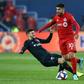 Toronto FC's Alejandro Pozuelo, evading a tackle attempt by DC United's Paul Arriola, has sparked the Canadian MLS squad in the wake of an injury to Jozy Altidore
