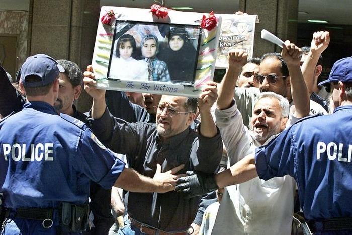 Families of those killed in the disaster protested in 2001 against Australia's hardline asylum-seeker policies