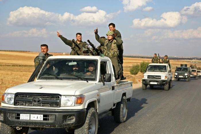 Turkish-backed Syrian rebel fighters are gathering near the border, with Ankara saying preparations have been completed for an offensive into northern Syria