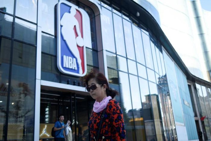 A bipartisan group of eight US lawmakers on Wednesday urged NBA commissioner Adam Silver to suspend all league activities in China until a sponsor and telecast boycott ends, which would close such places as the NBA merchandise store in Beijing