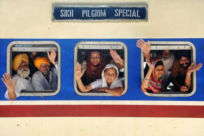 Indian Sikh pilgrims on a train bound for Pakistan in 2010. Officials from both countries are meeting to discuss visa-free travel for Indian Sikh's wanting to visit Nankana Sahib, the birthplace of Sikhism's founder in Pakistan