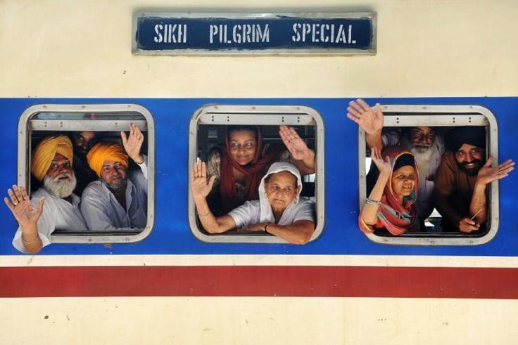 Indian Sikh pilgrims on a train bound for Pakistan in 2010. Officials from both countries are meeting to discuss visa-free travel for Indian Sikh's wanting to visit Nankana Sahib, the birthplace of Sikhism's founder in Pakistan