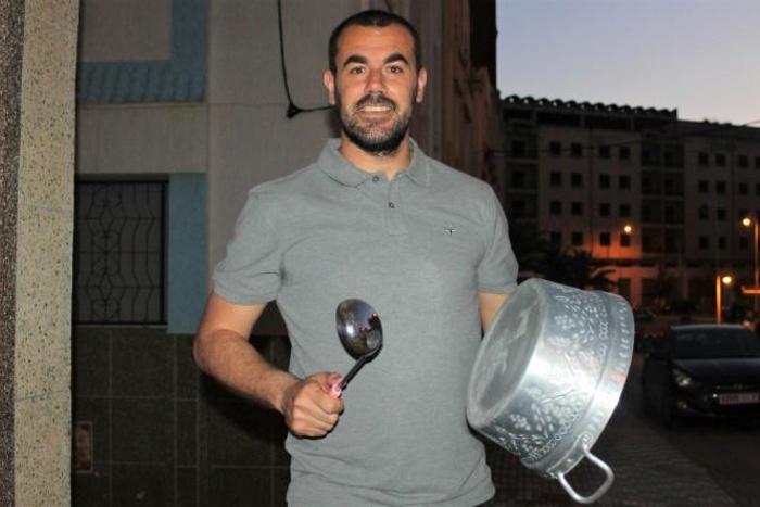 Moroccan activist Nasser Zefzafi bangs on a pot during a protest in the northern city of Al-Hoceima on May 6, 2017